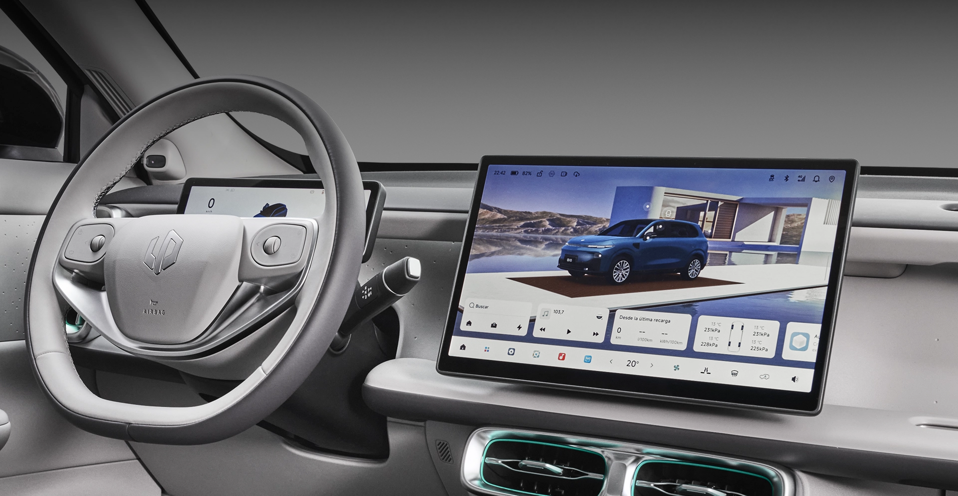 Multimídia com principais apps Painel do Leapmotor B10 com volante, console central e tela multimídia exibindo a imagem do veículo.